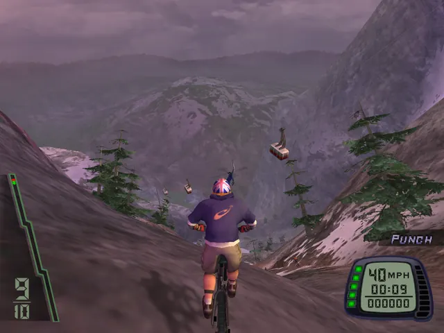 A rider at 40 mph descends a ridge beneath a cable car.