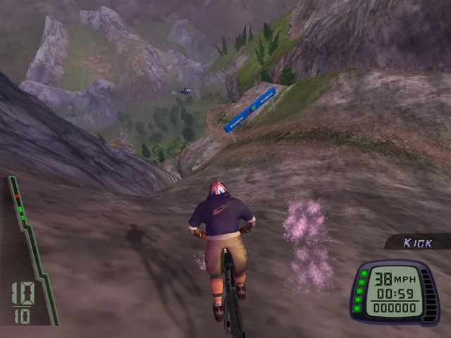A rider at 38 mph crests a dirt ridge above a green valley, a helicopter overhead.